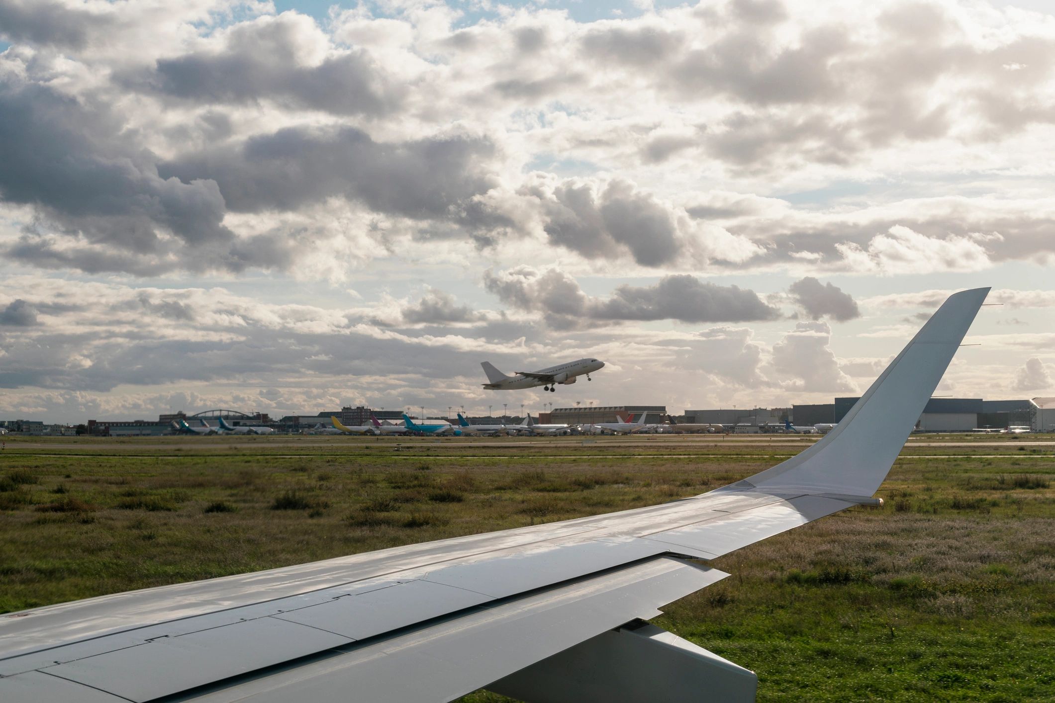 Airplane on runway representing travel support and coordination