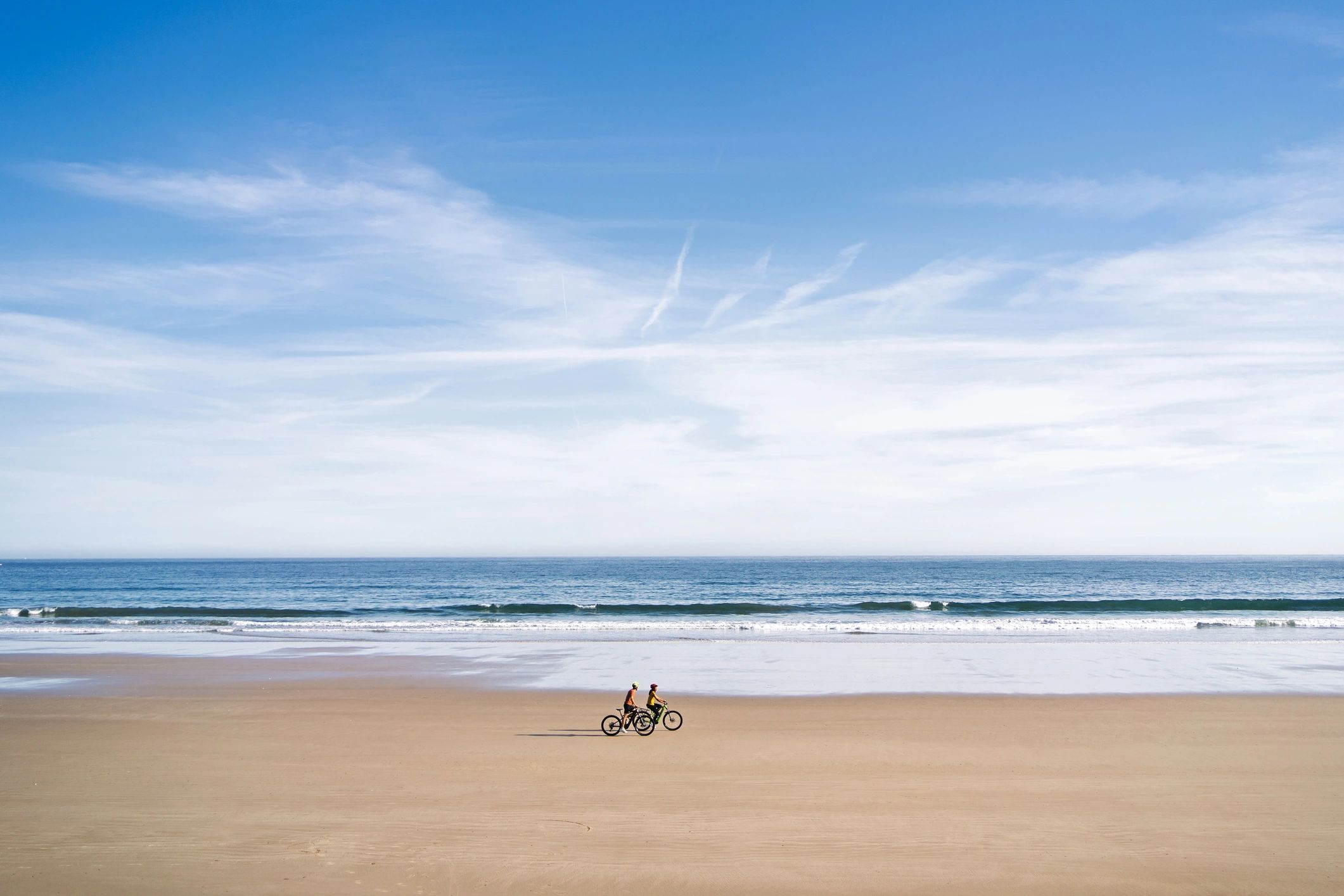 Travelers exploring a scenic beach destination
